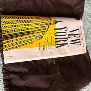 Kate Spade NYC map paper bag clutch